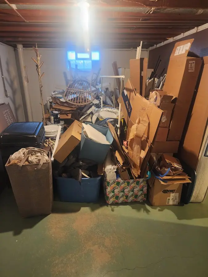 Roll-off dumpster container at job site for Roll Off Dumpster Rental in Oliver Springs